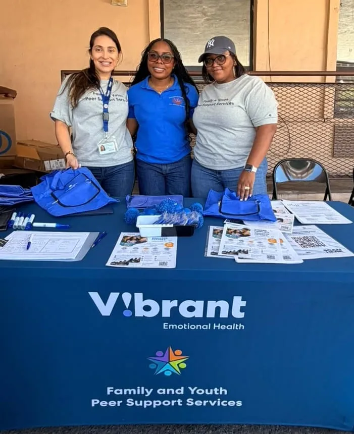 Partners from Vibrant Emotional Health at their resource table