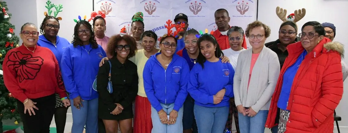 Compassion Champions volunteers and community members together at an event